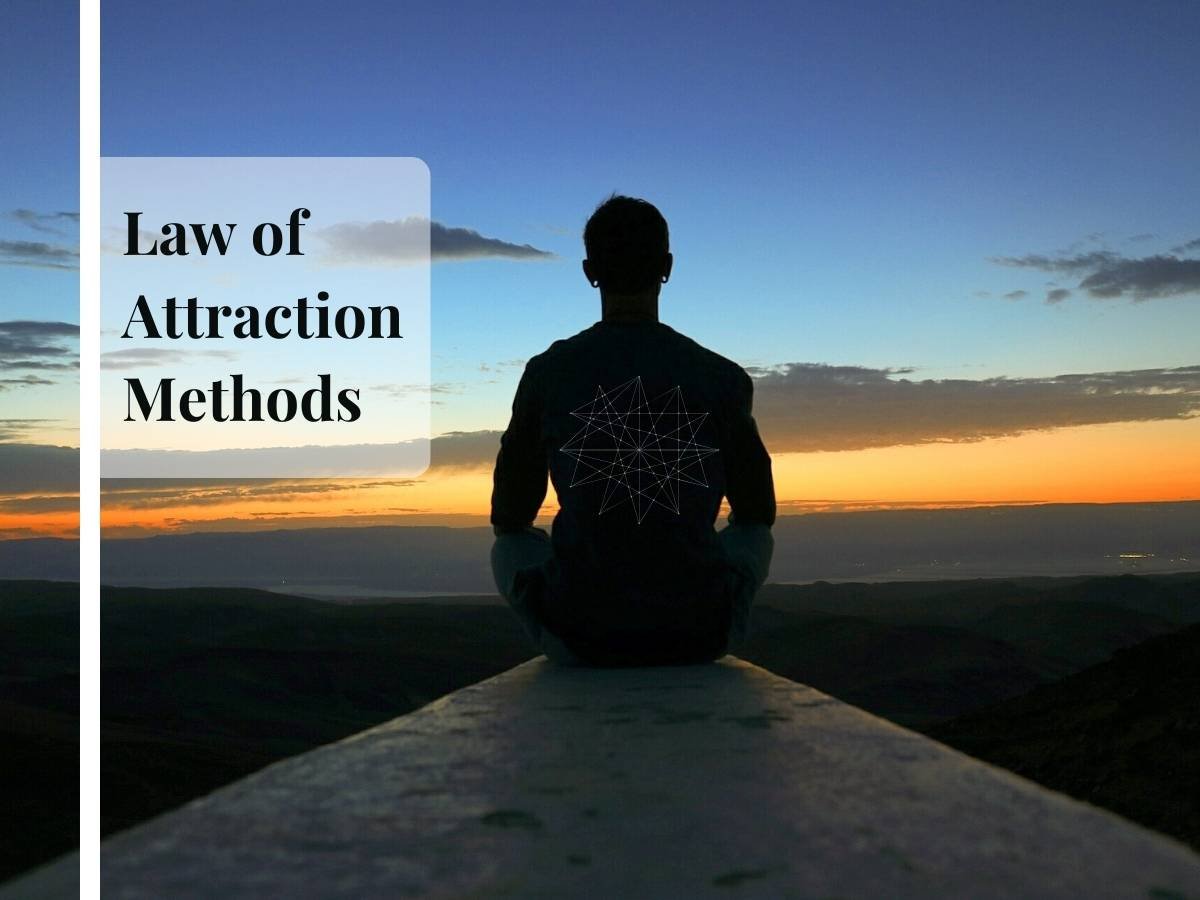 Man meditating on beach near sunset